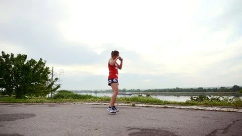 Girl practicing kickboxing Stock Footage 110842234