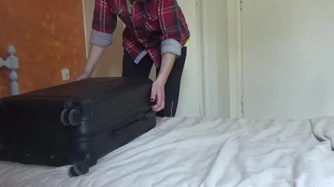 A girl is preparing for a trip Stock-Footage 308816218