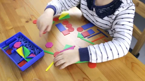 Girl preschooler performs a task Stock-Footage 101017171