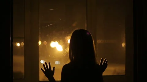 The girl pressed against the window Stock Footage 42878956