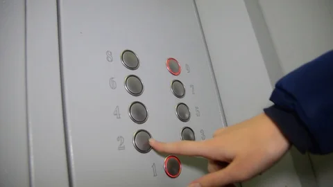 Girl pushes all the buttons in the elevator Stock Footage 98896241