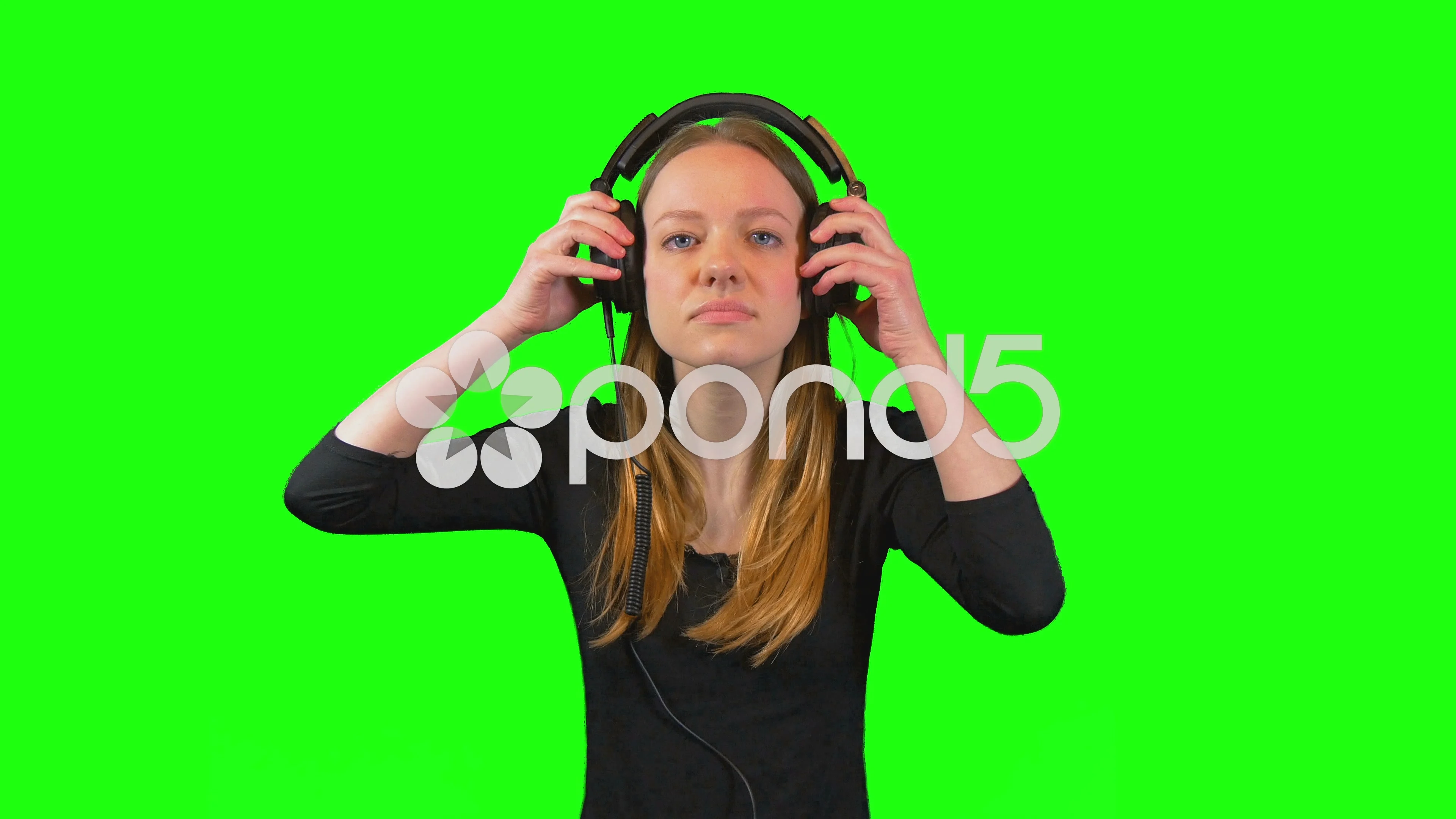 Girl putting on headphones start dancing shot in 4K ULTRA HD