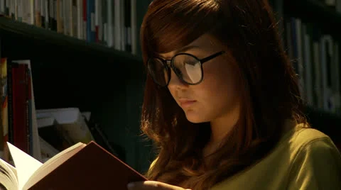 Girl reading 2 Stock Footage 25567873