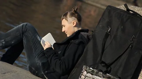 Girl reading a book Stock Footage 5165591