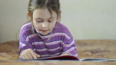 Girl reading Stock Footage 23932012