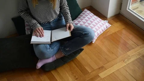 Girl reading her notebook Video stock 72692801