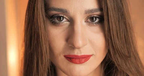 Girl with red lips posing for the camera. Female looking directly at the camera Stock Footage 120847573