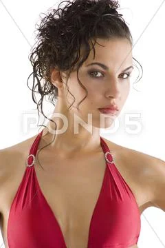 Girl with red swimsuit Stock Photos