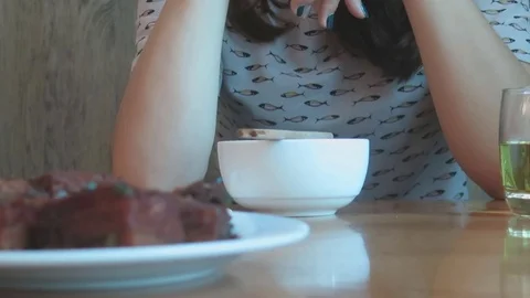 Girl in restaurant Stock Footage 70372374