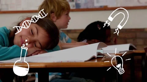 Girl resting head on desk in class, science icons appearing over workbook, Stock Footage 333904332