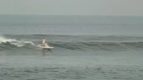 Girl is Riding on the Waves Stock Footage 67532695