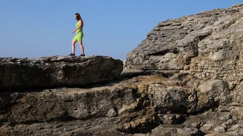 Girl on the rock Stock Footage 249468280