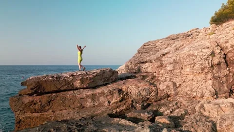 Girl on the rock Stock Footage 249689980