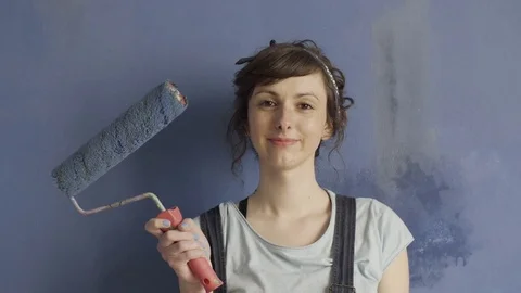 Girl with roller for dyeing Video stock 83866340