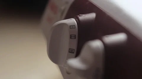 Girl rotates the mode selector Stock Footage 71296739