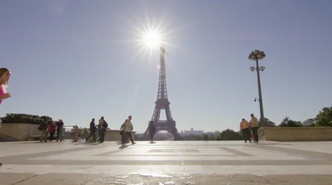 Girl running though Paris with Eiffel tower in the background. Stock Footage 63029875