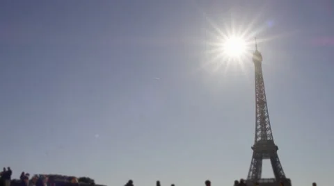 Girl running though Paris with Eiffel tower in the background. Stock Footage 63030770