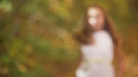 The girl is running through the forest Stock Footage 83877848