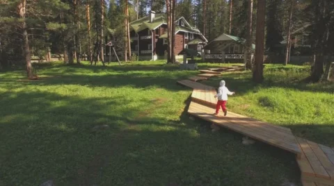 Girl runs along the path. Stock Footage 60435066