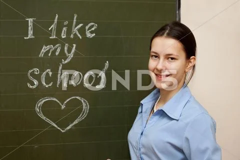 Girl at a school board Stock Photos