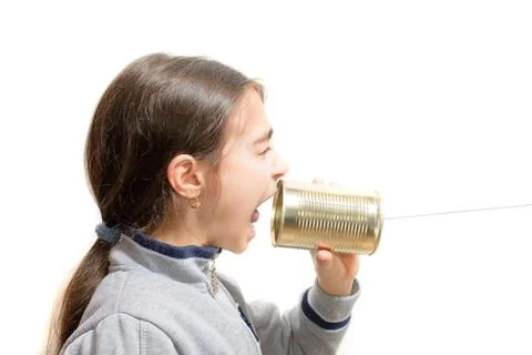 Girl screaming in the phone built with the jar Stock Photos