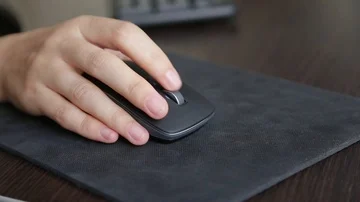 Girl scrolling mouse, close-up Stock Footage 85637173