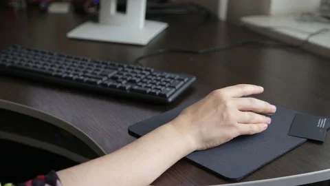 Girl scrolling mouse, close-up Stock Footage 87130462