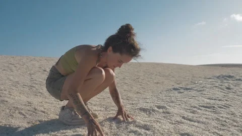 Girl Searching for Shells on White Shell Beach – Western Australia Stock Footage 316170872