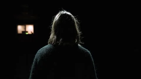 Girl seen from behind while singing in a theatre. Stock Footage 228949915