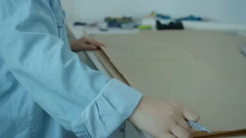Girl in the sewing studio Stock Footage 234872981