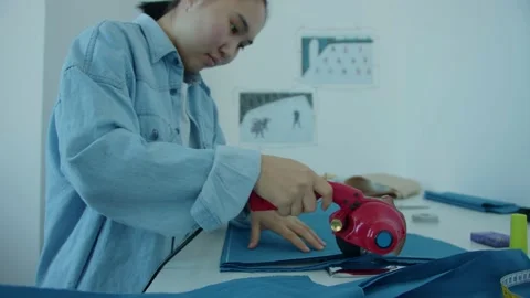 Girl in the sewing studio Stock Footage 234873013