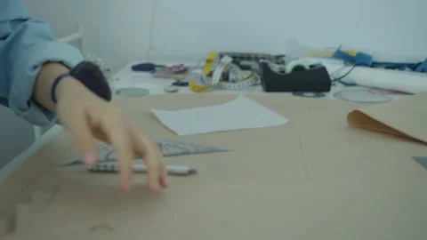 Girl in the sewing studio Stock Footage 234873125