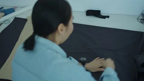 Girl in the sewing studio Stock Footage 234873264