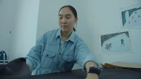 Girl in the sewing studio Stock Footage 234873282