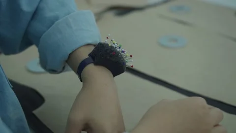 Girl in the sewing studio Stock Footage 234873311