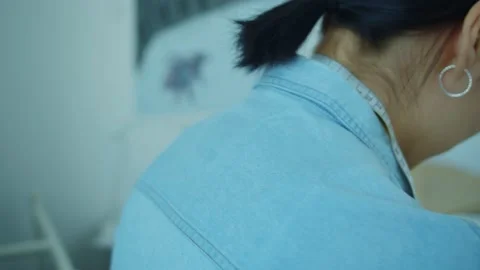 Girl in the sewing studio Stock Footage 234873361