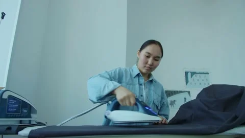 Girl in the sewing studio Stock Footage 234873633