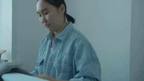 Girl in the sewing studio Stock Footage 234873810