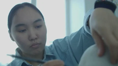 Girl in the sewing studio Stock Footage 234874148