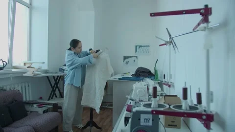 Girl in the sewing studio Stock Footage 234874198