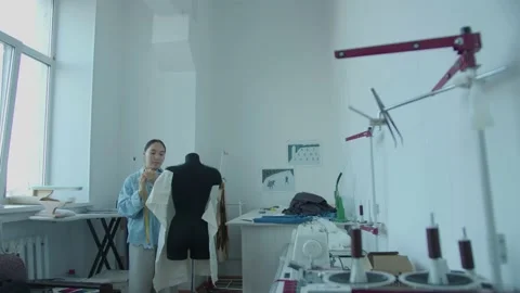 Girl in the sewing studio Stock Footage 234874230