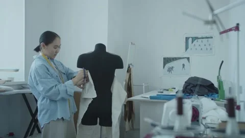 Girl in the sewing studio Stock Footage 234874248