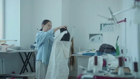 Girl in the sewing studio 動画素材 234874268