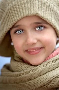 Girl sheltered for the cold Stock Photos