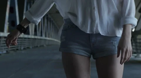 Girl in shorts posing for the camera Stock Footage 60989600