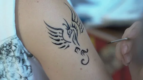 Girl on the shoulder with henna tattoo Stock Footage 115595053