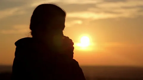 Girl silhouette at dawn (close-up) Stock Footage 32420153