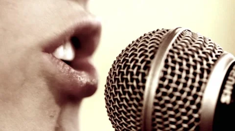 Girl singing into microphone Rack Focus Stock Footage