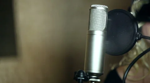 The girl singing in the Studio Stock Footage 59872116