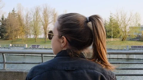 Girl sits back Video stock 106854300